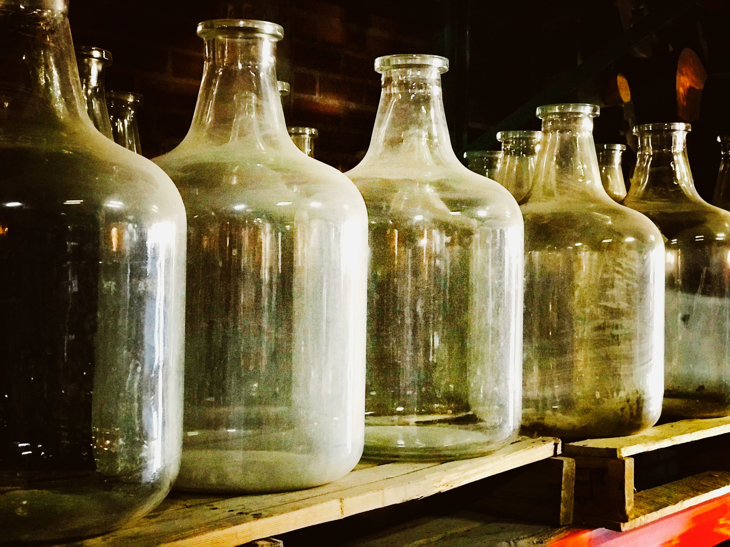 Antique glass bottles in a row